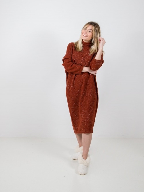 Woman knitted turtleneck dress Tile