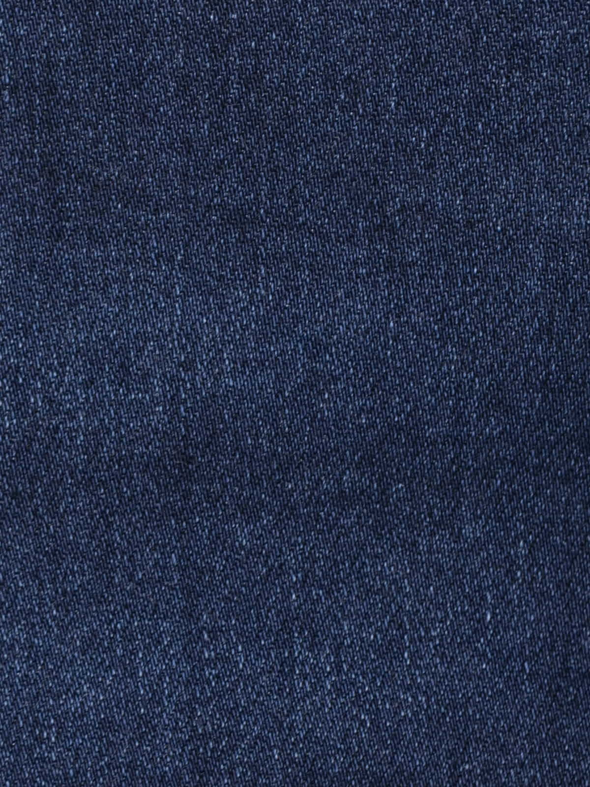 Pantalón jean tachas color azul oscuro