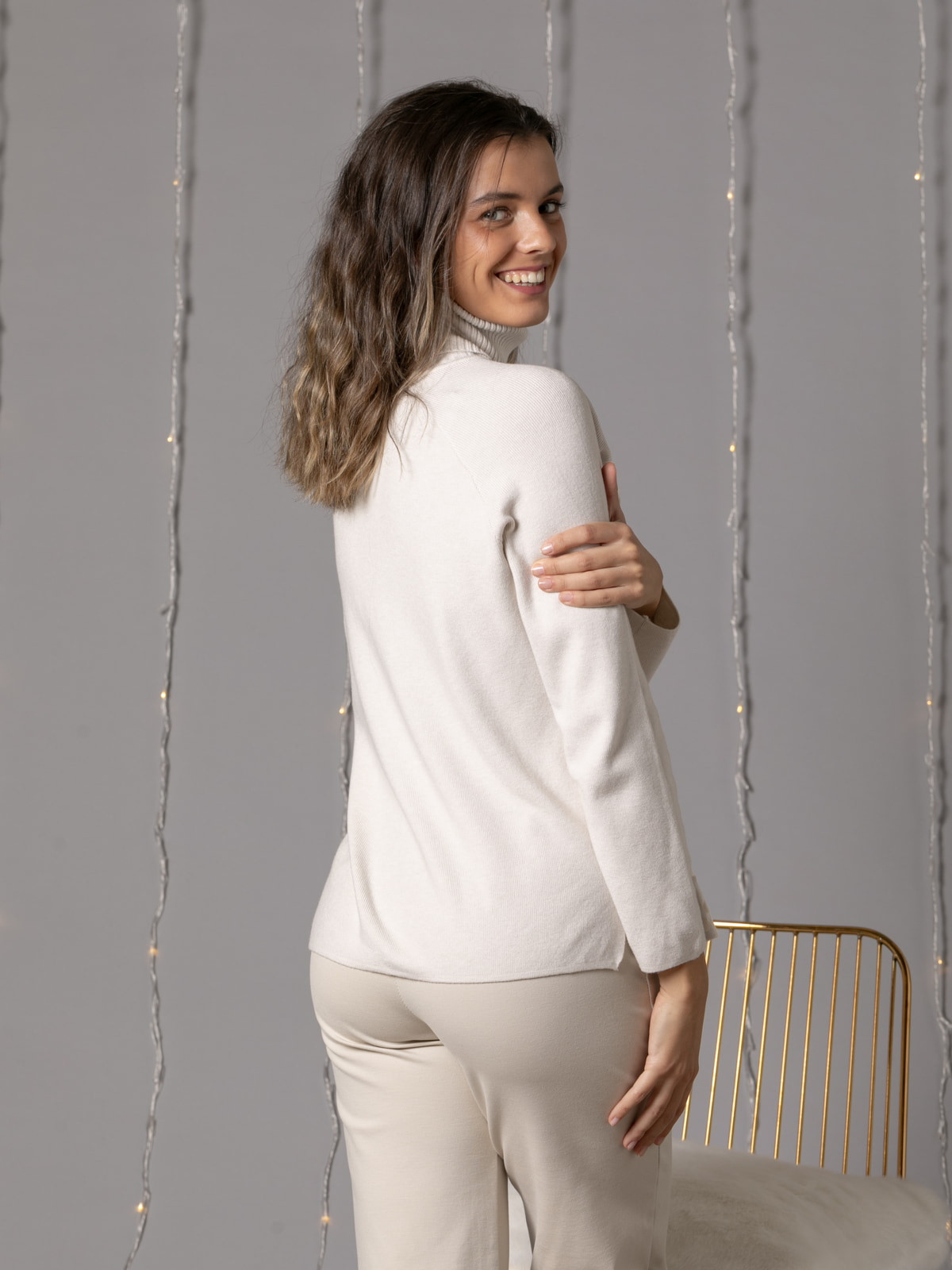 Soft sweater with party appliqués and back wrap  Beige colour