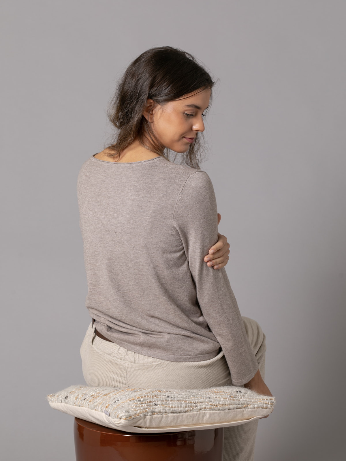 Soft trendy sweater with eco-leather detail on the hem  Taupe colour