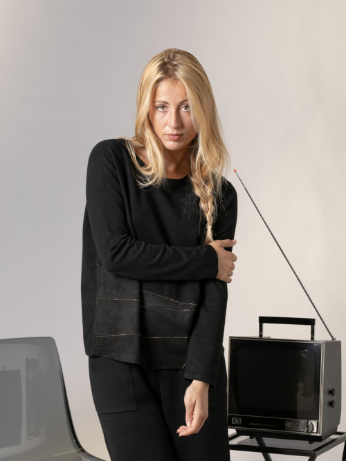 Soft trendy sweater with eco-leather detail on the hem  Black colour