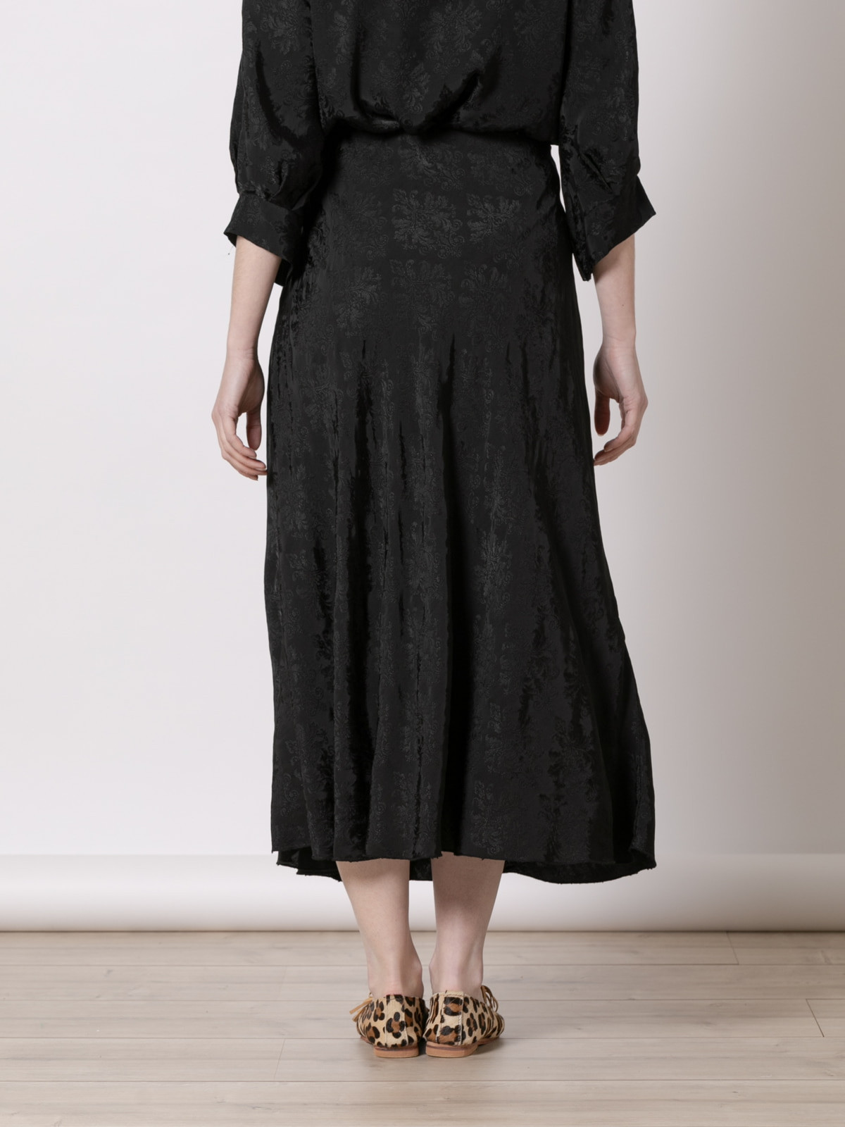 Long flowing skirt with matching embroidery  Black colour