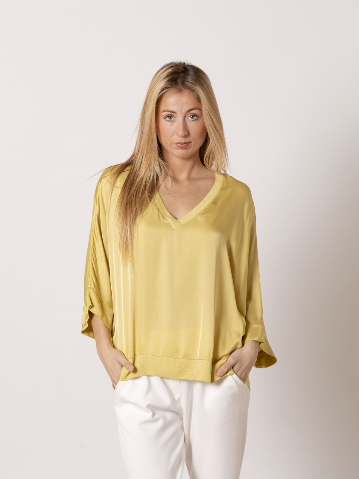 Flowing V-neckline shirt in viscose satin  Amarillo colour