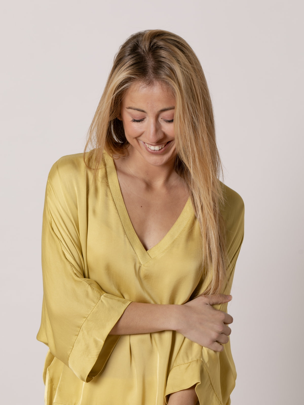 Flowing V-neckline shirt in viscose satin  Amarillo colour