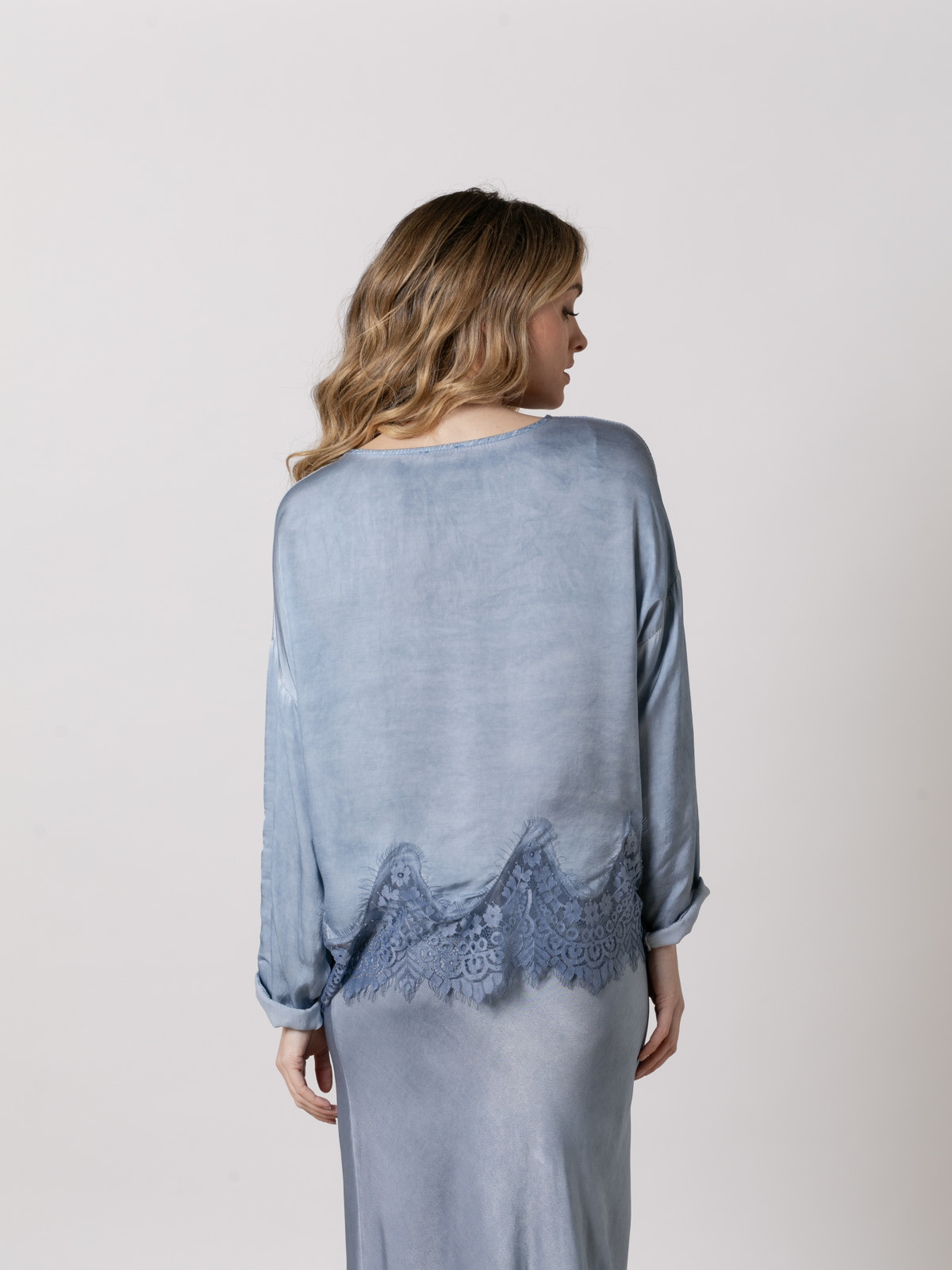 Flowing shirt with lace at the bottom  Blue colour