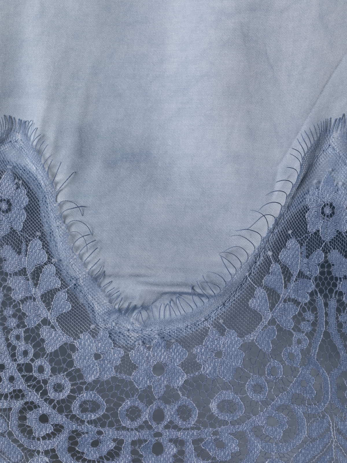 Flowing shirt with lace at the bottom  Blue colour